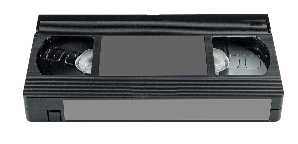 Picture of a VHS tape, seen from an angle that show both the top and front labels.